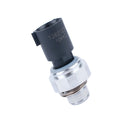 Silver automobile fuel pressure sensor with single port on a white background.