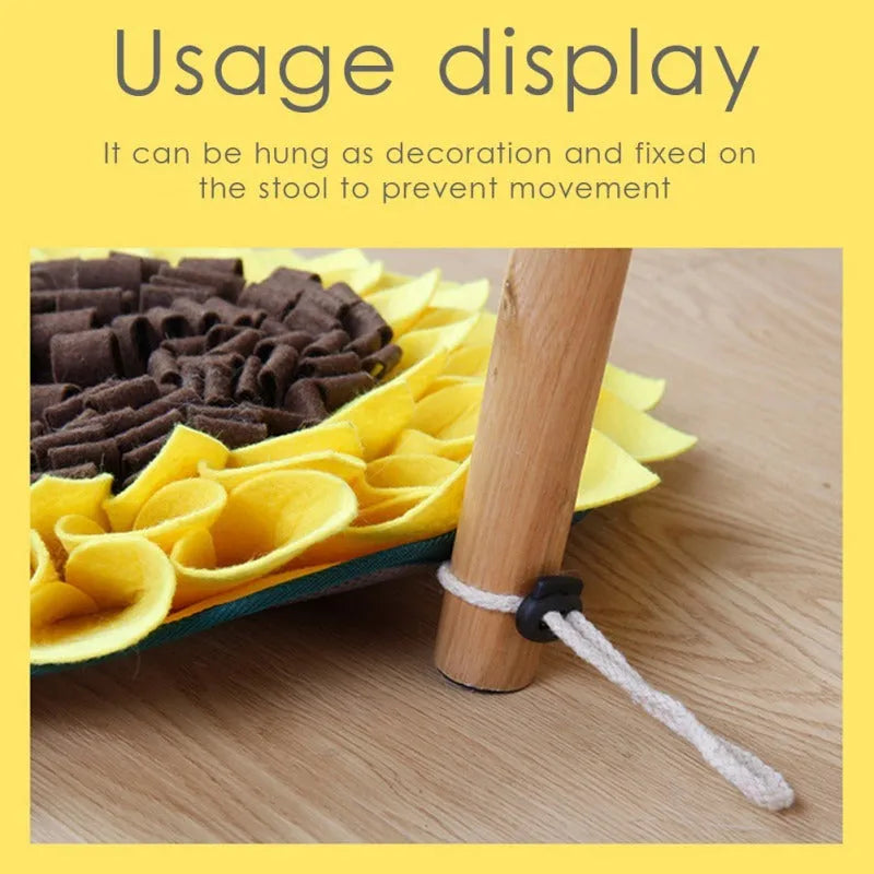 Yellow sunflower-shaped dog snuffle mat with rope attachment for nosework training