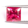 Lab-created pigeon blood red ruby gemstone shown in egg, round, princess, and water drop cuts.