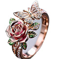 Adjustable butterfly ring with colourful oil drip design featuring floral and insect motifs