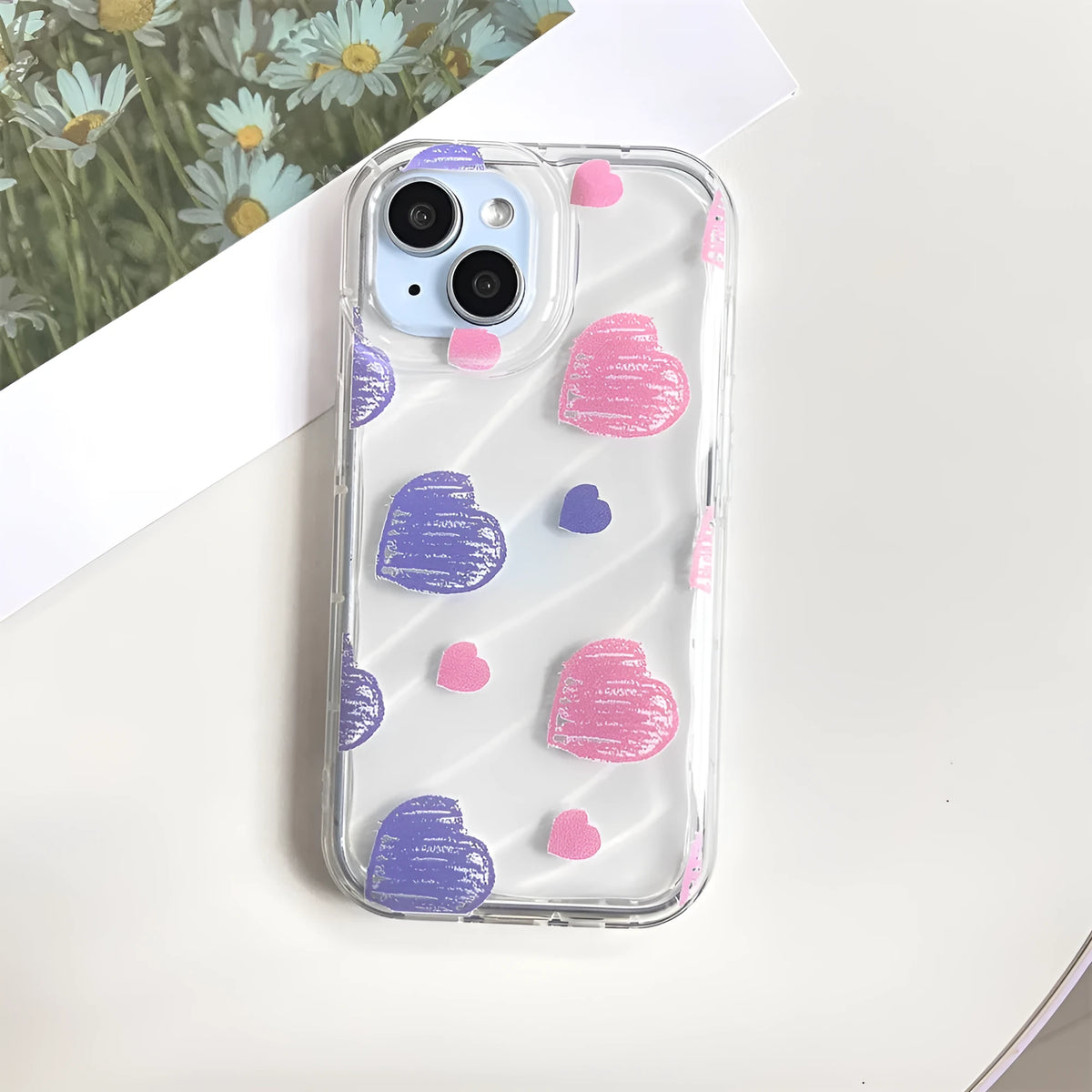 Transparent iPhone case with pink and blue heart design, TPU all-inclusive cover with fall protection and sprayed finish