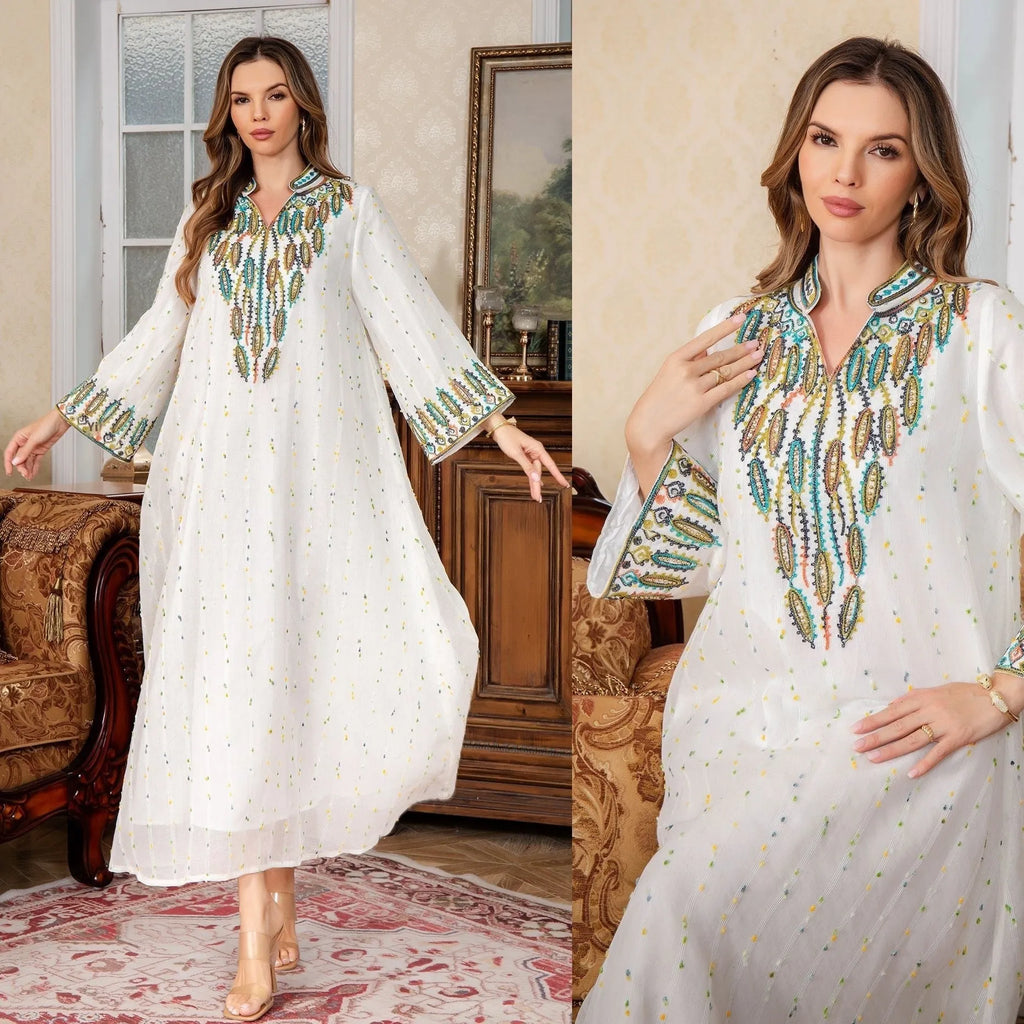 Women's white Arabic robe dress with long sleeves and floor-length skirt in polyester fabric