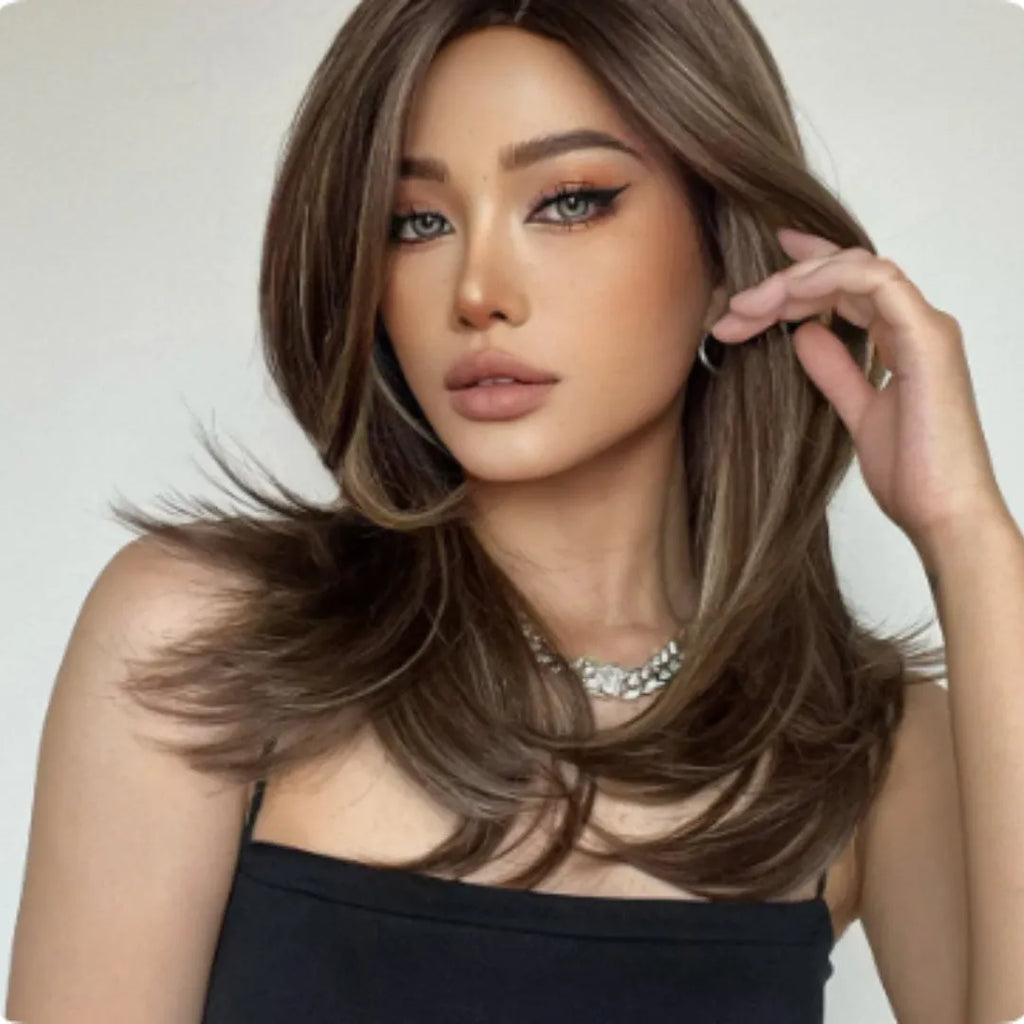 Mid-length curly gradient colour wig in high-temperature fibre on a stand.