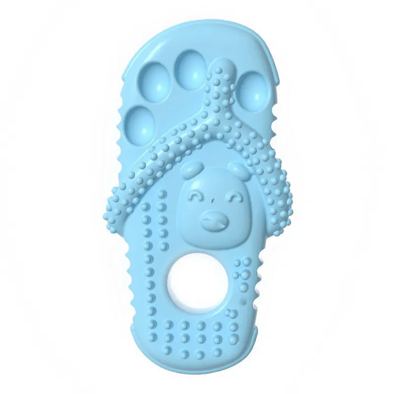Rubber slipper-shaped dog chew toy for puppies and small to medium dogs in blue, green, orange or pink