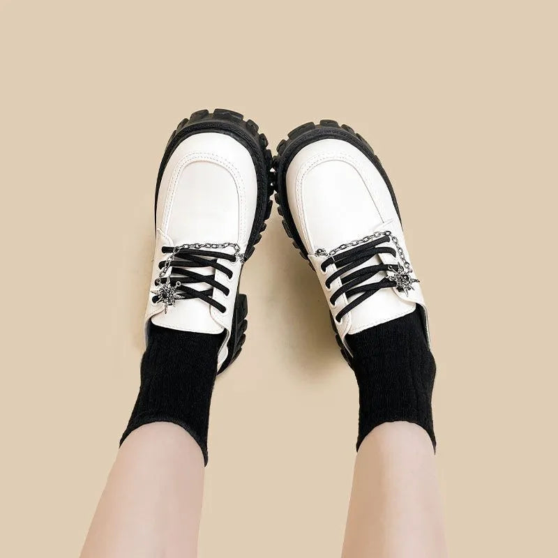 Women's Duke Asterism colour loafers with metal cross shoulder strap and round toe in preppy college style