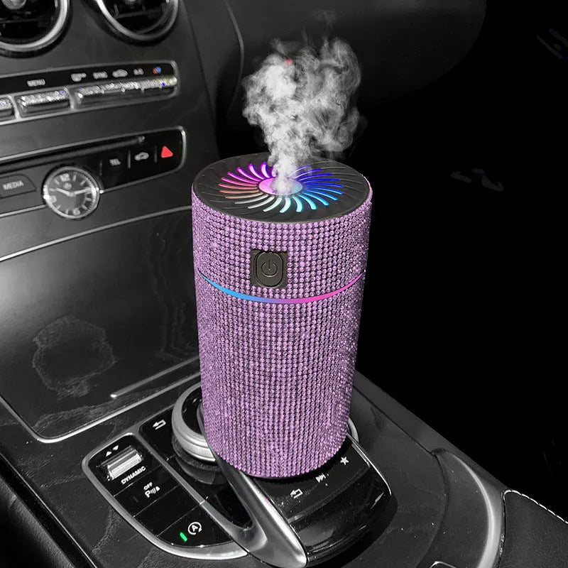 Compact car-mounted air purification humidifier unit on vehicle dashboard with USB power cord