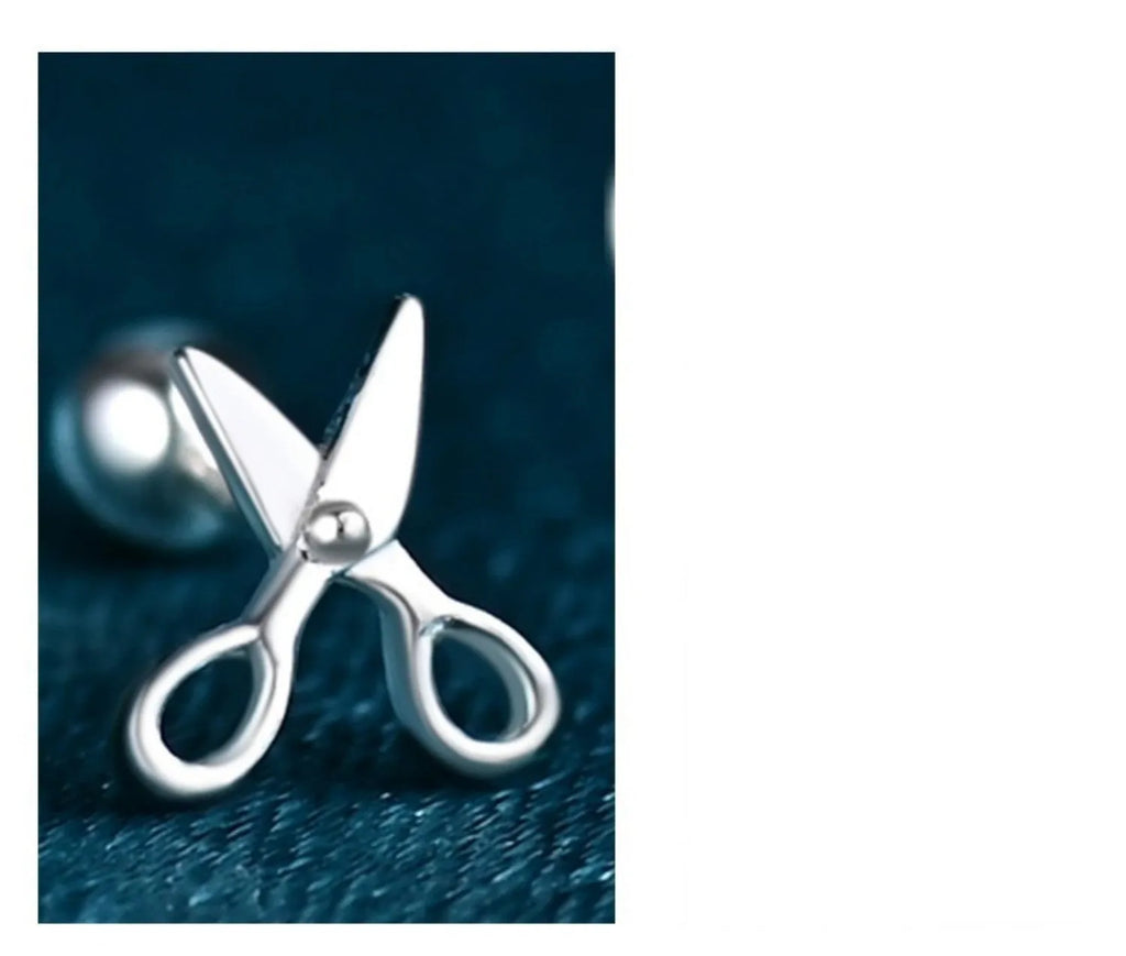 Pure silver screw-back ear nails featuring a miniature scissors charm