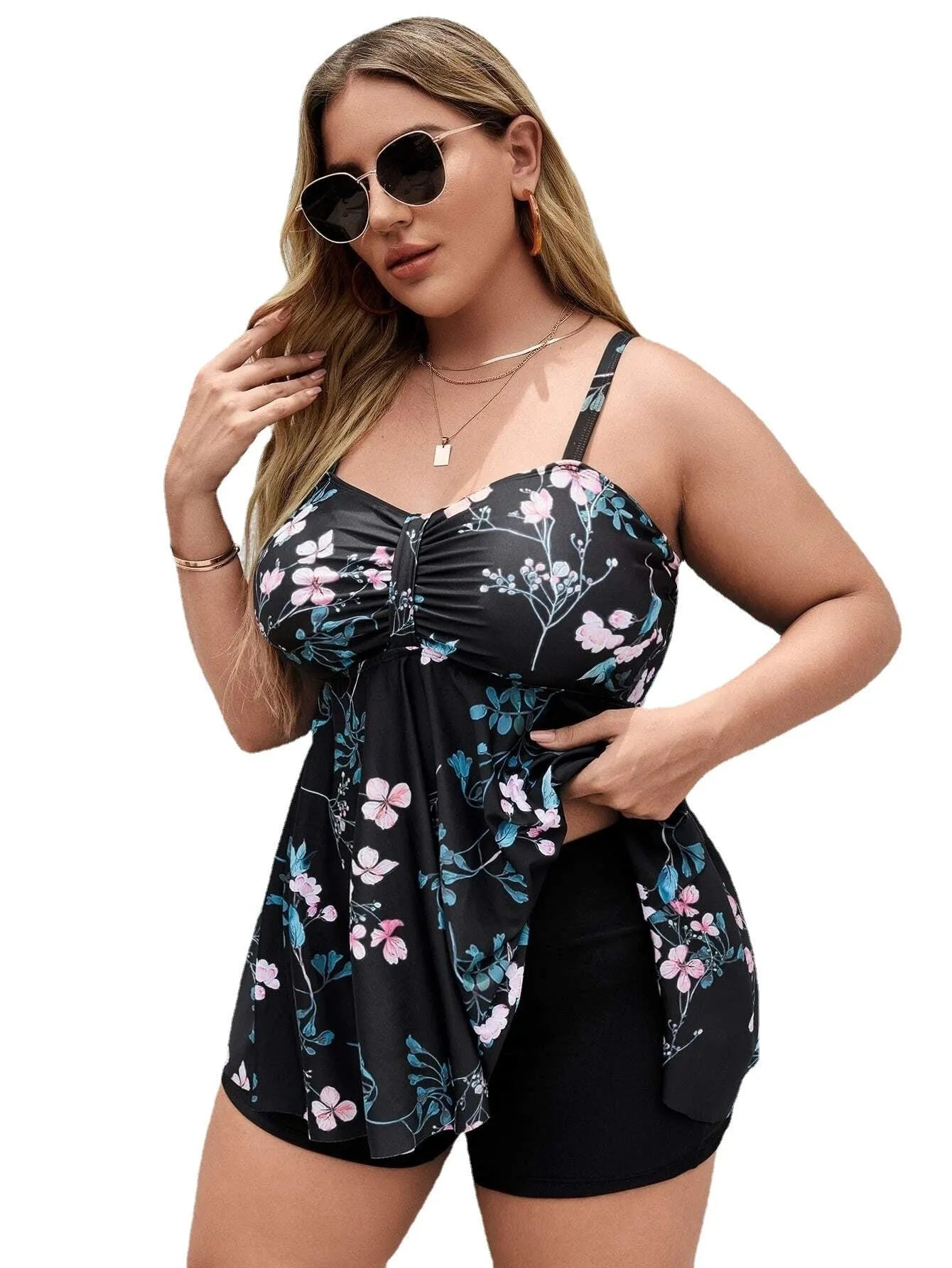 Women's floral print split colour one-piece swimsuit on hanger showing front design details