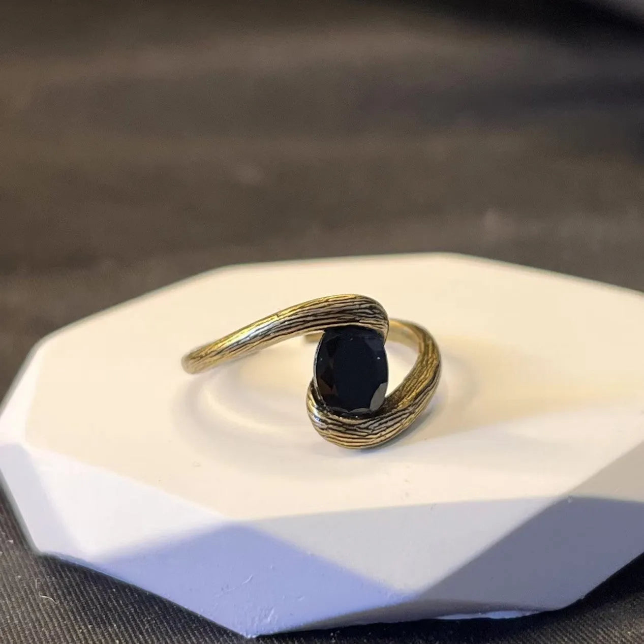 Copper adjustable ring with brushed finish and diamond coloured gem in retro heart shape