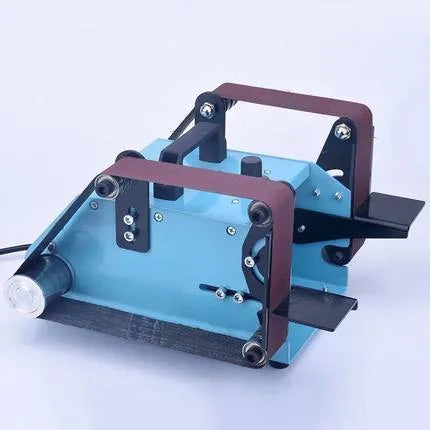 Blue desktop dual-axis belt sander with 750W motor and variable speed control on benchtop