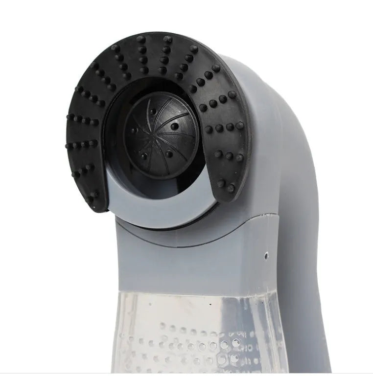 Grey handheld pet grooming vacuum cleaner with soft rubber head for dogs and cats