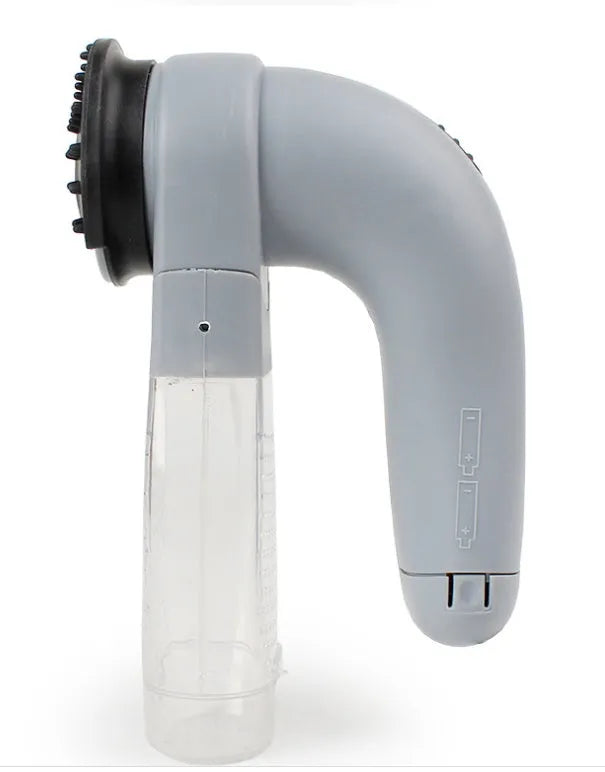 Grey handheld pet grooming vacuum cleaner with soft rubber head for dogs and cats