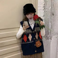 Loose sleeveless cardigan with diamond plaid pattern in khaki colour