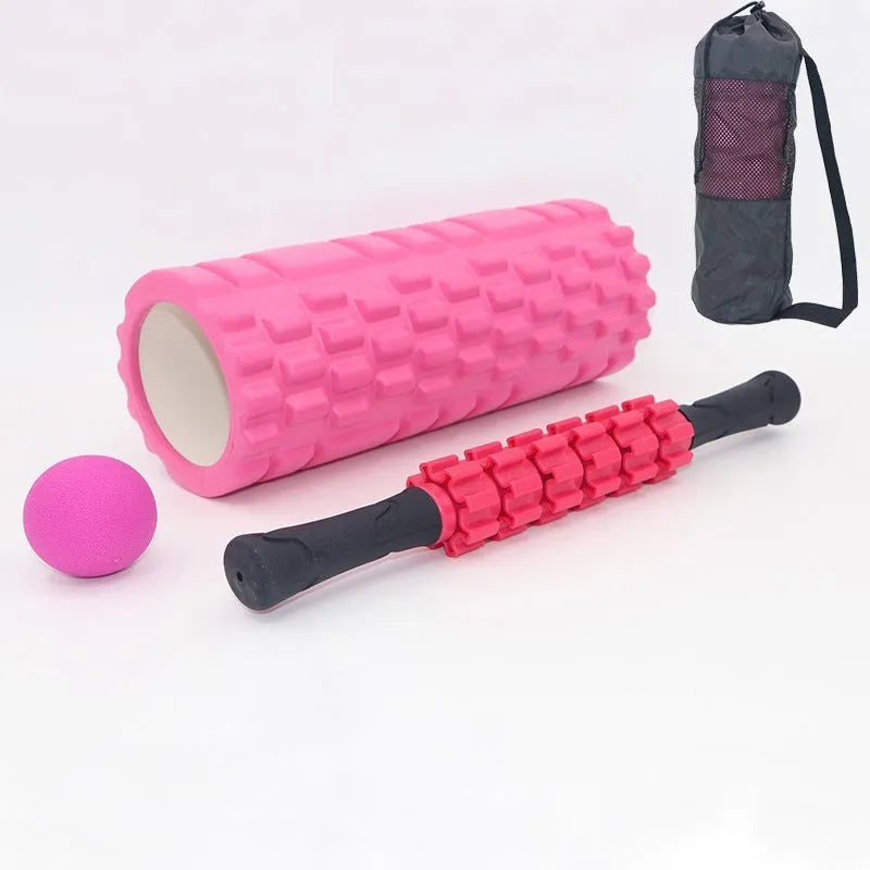 Black foam massage roller measuring 33cm with six separate massage pieces along shaft
