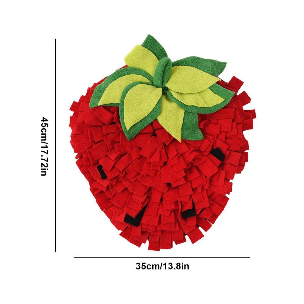 Red and green strawberry-shaped pet slow feeder mat with textured hiding spots
