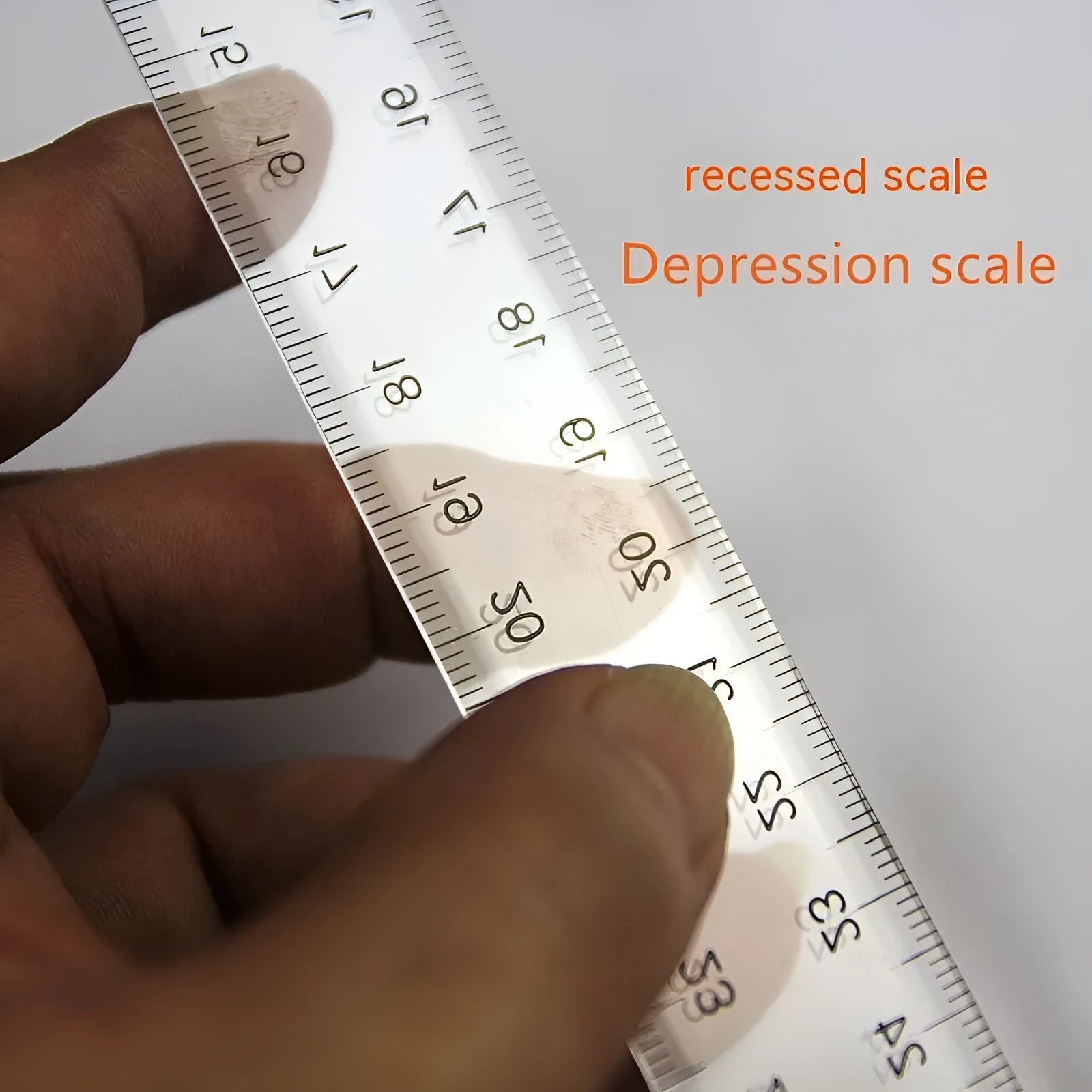 Plastic T-shaped ruler measuring 30cm long, shown in transparent and orange yellow colour options.