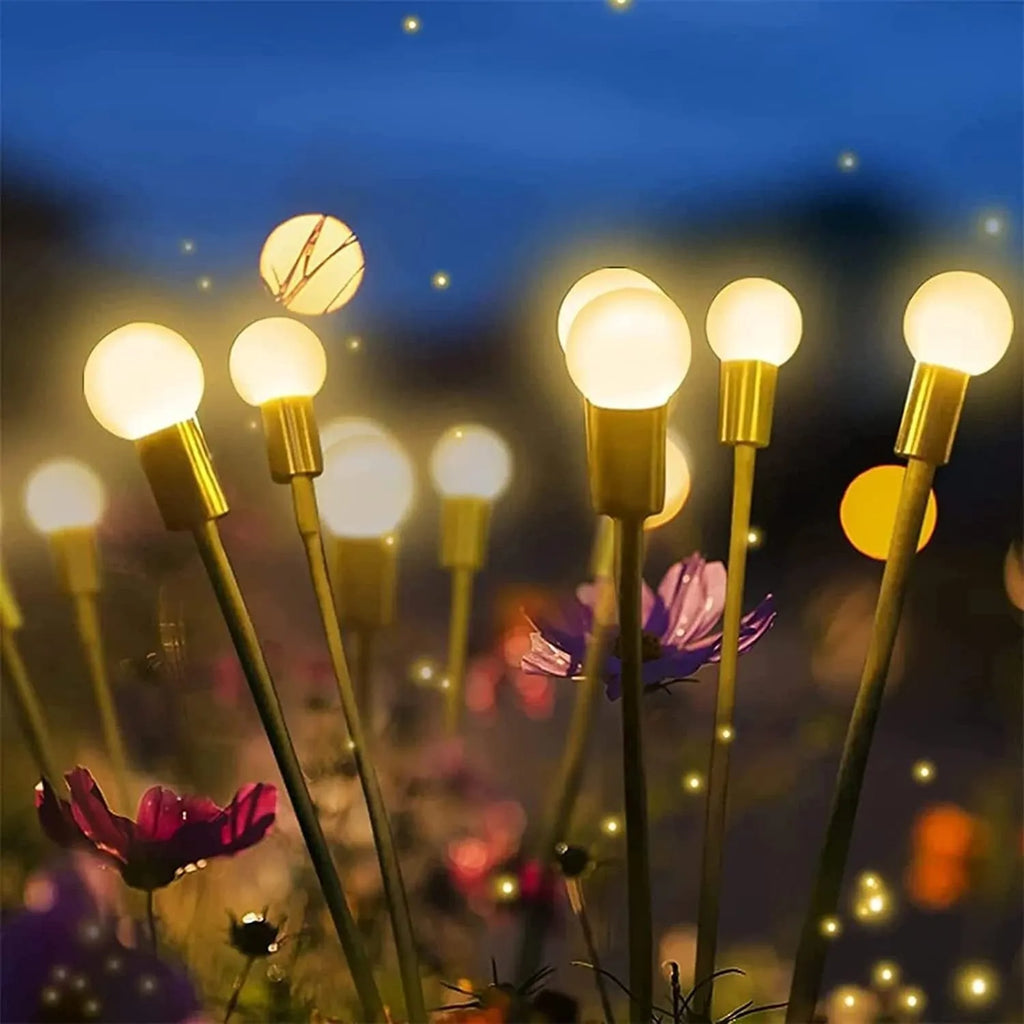 Solar-powered LED ground spike lamp with multiple light heads for garden pathway lighting
