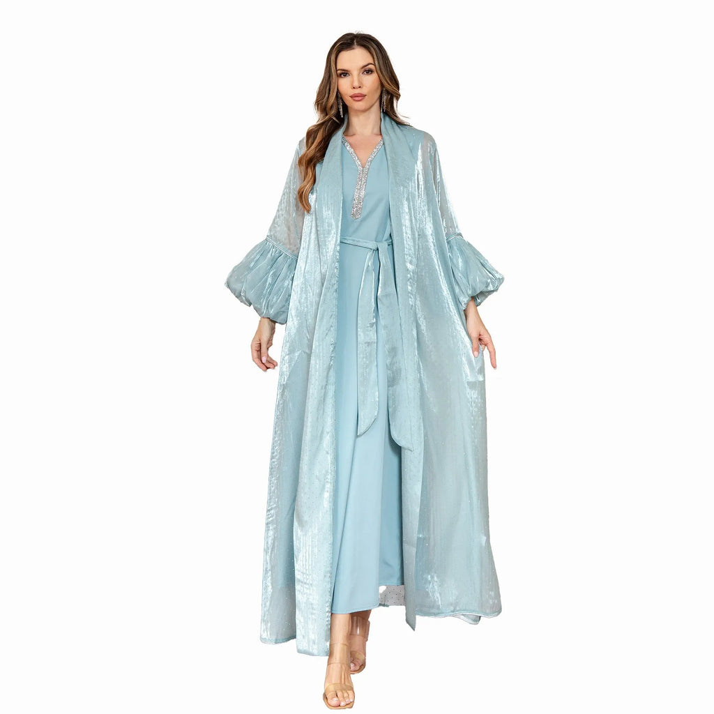 Blue Arabic two-piece formal dress set with rhinestone detailing and long sleeves.