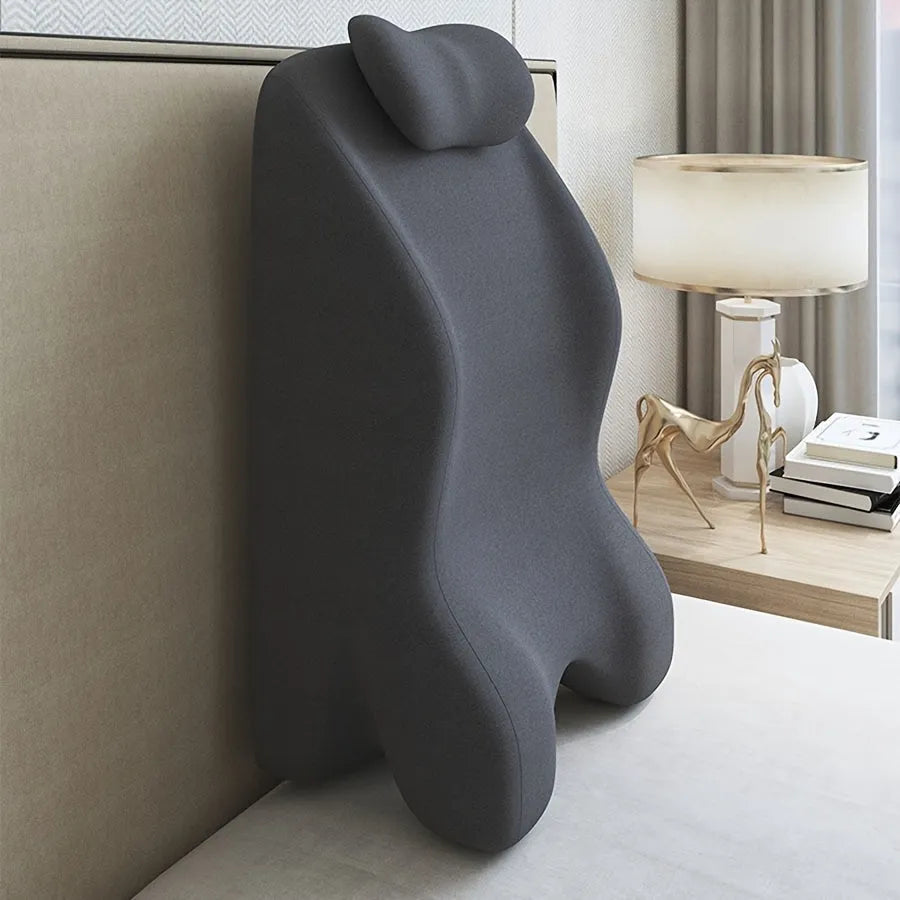 4-inch stomach sleeper pillow shown in blue, designed for prone sleeping positions and reading while lying down