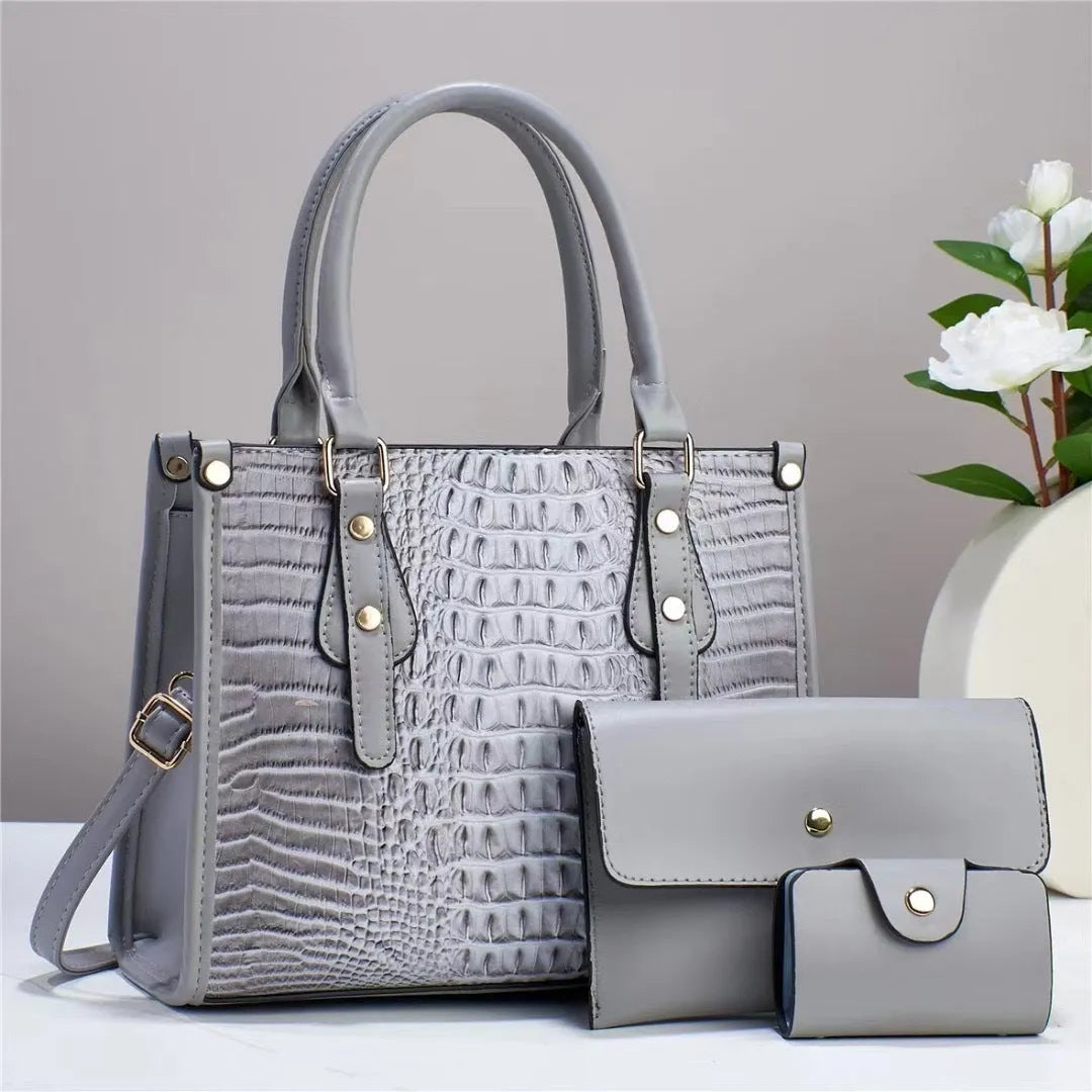 Women's PU leather three-piece crossbody set with wallet and card holder in burgundy colour