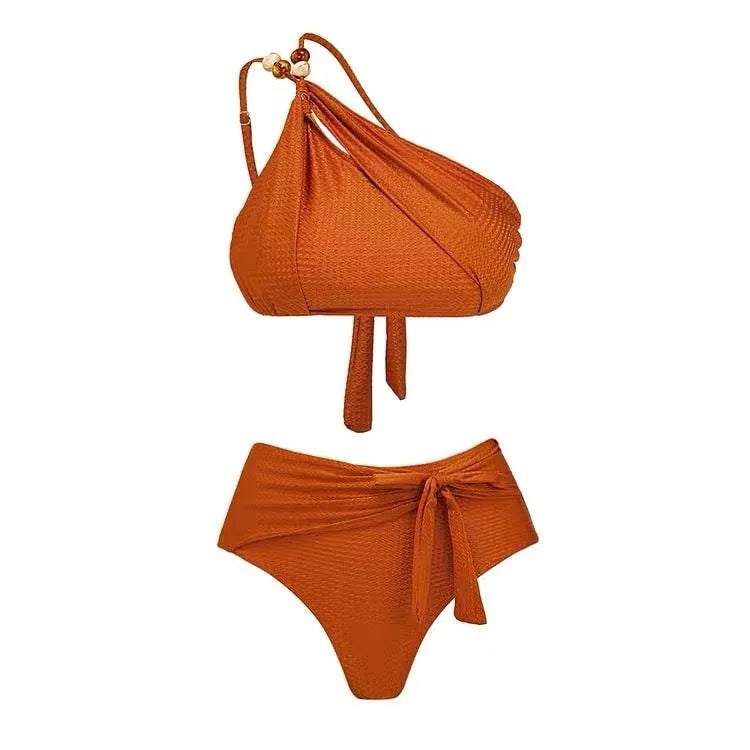 Women's brown push up bikini with high waist briefs and a matching sheer chiffon dress overlay.