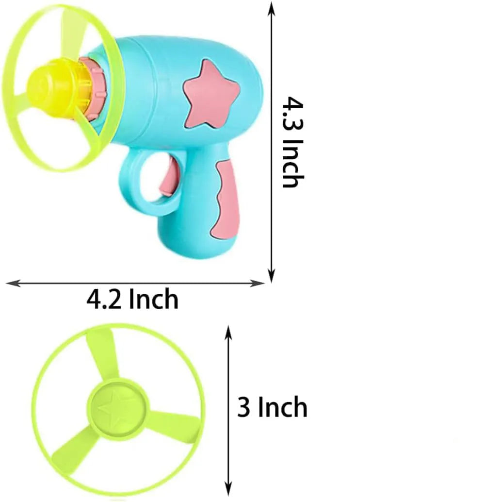 Blue plastic interactive cat toy gun with a mounted pink Frisbee on a table.