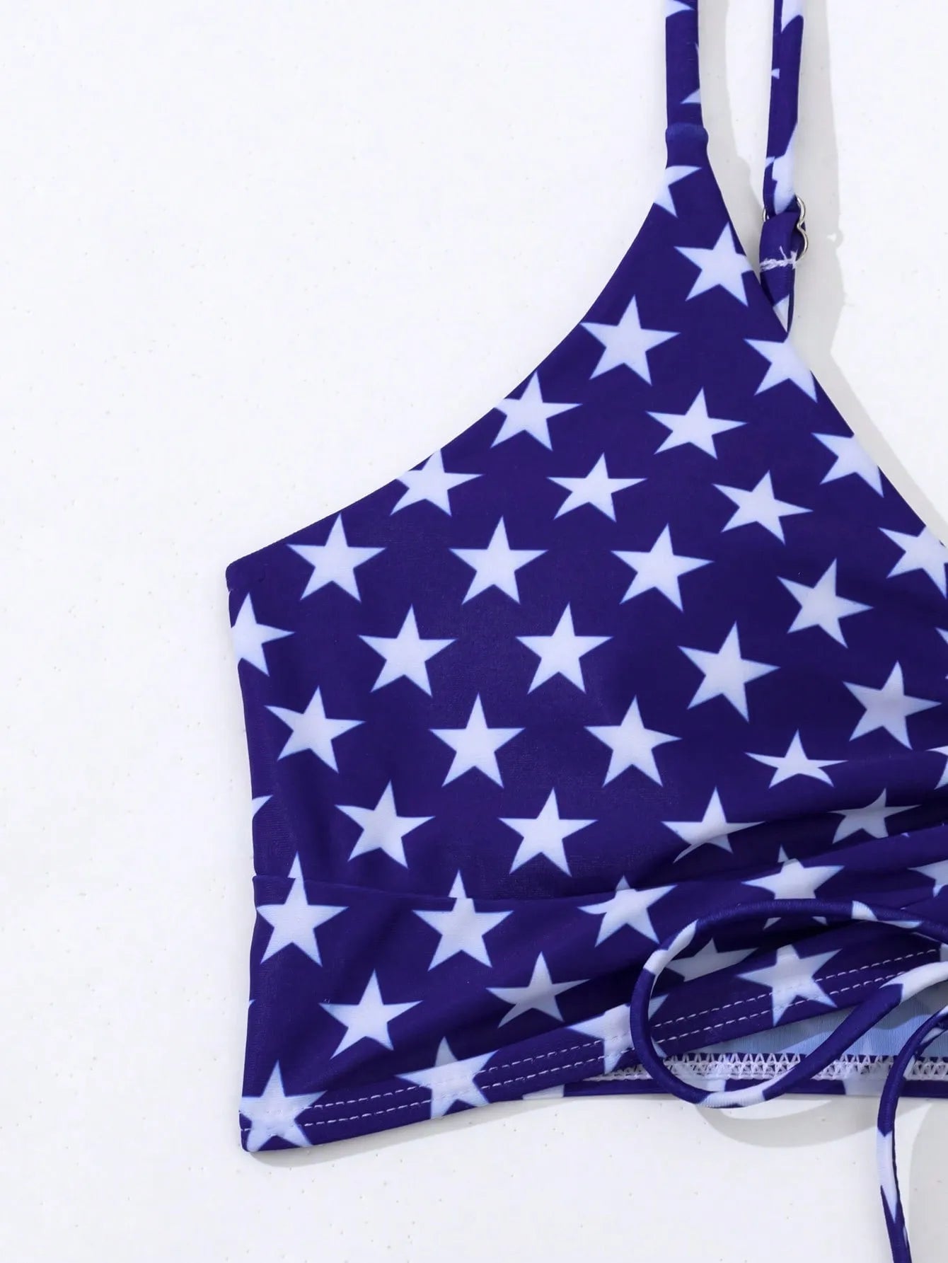 Women's blue and red stars and stripes high-waist swimsuit with a white drawstring waistband