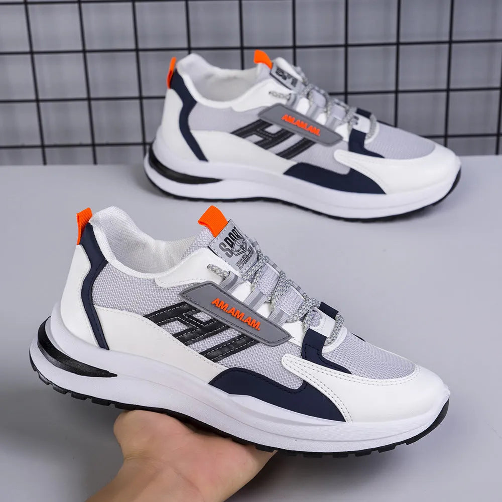Men's sports sneakers in light grey or black with PU and mesh upper, front tie fastening, plastic sole, sizes 39-44
