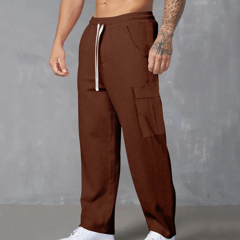 Men's corduroy cargo trousers in loose-fitting wide-leg design with drawstring waist
