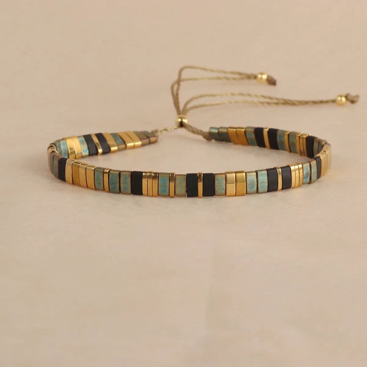 European American style pull bead bracelet with geometric designs in five colour options