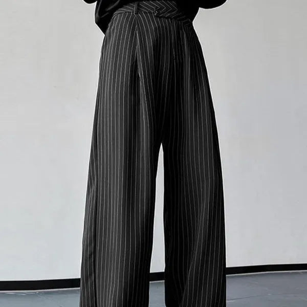 Black men's casual trousers with vertical stripes and front pleats, made from a soft rabbit hair and bamboo fibre blend.