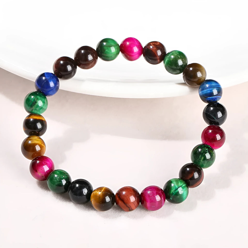 Colourful tiger eye bracelet with natural gemstone beads in multiple sizes on mixed string