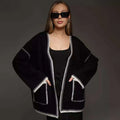 Lace-up front knitted cardigan in a thick imitation cashmere blend, shown in camel colour