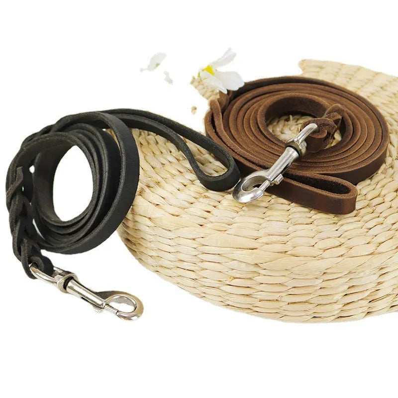 Cowhide leather dog walking lead in black or light brown, 120cm to 260cm long and 1.2cm wide.