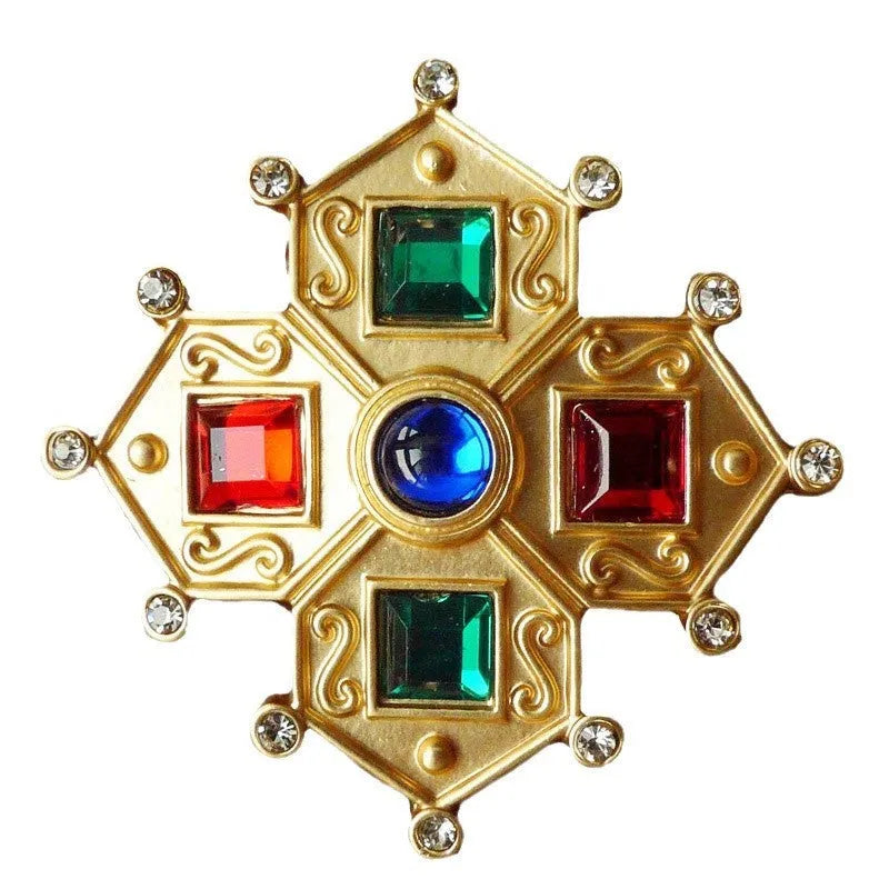 A diamond-shaped Retro Court Baroque vintage brooch made from zinc alloy, showing ornate detailing.