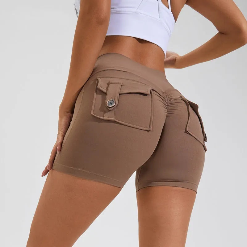 Women's high-waist hip lifting fitness shorts with pockets in electric blue colour