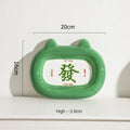 Ceramic pet bowl sculpted like an animal with a slanted interior for food, shown in a choice of colours.