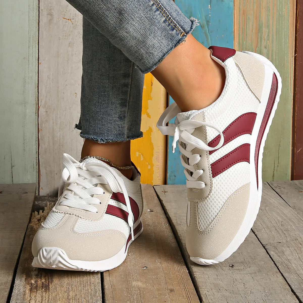 Wine red Cortez retro sneaker with breathable mesh surface and cross straps, low top flat heel, sizes 36-43
