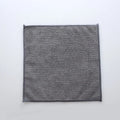 Grey square microfiber kitchen cleaning cloth for oilproof decontamination.