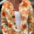 Yellow cardigan coat with a raised 3D digital print pattern on the front.