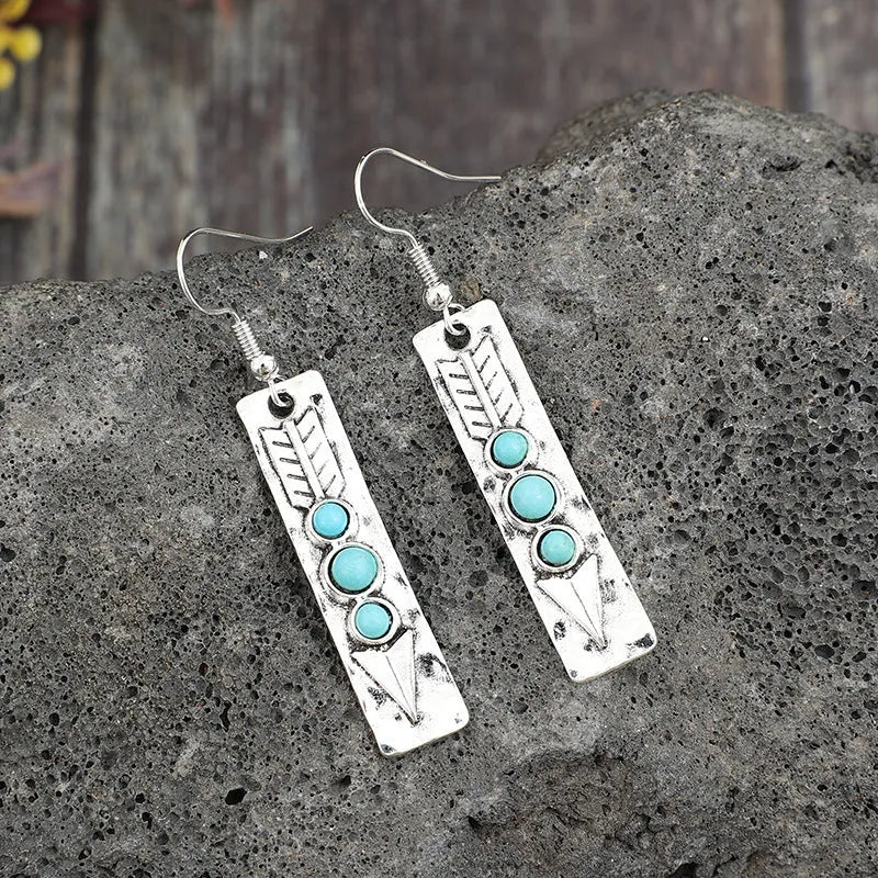 Silver geometric women's earrings with long strip design and inlaid turquoise detailing