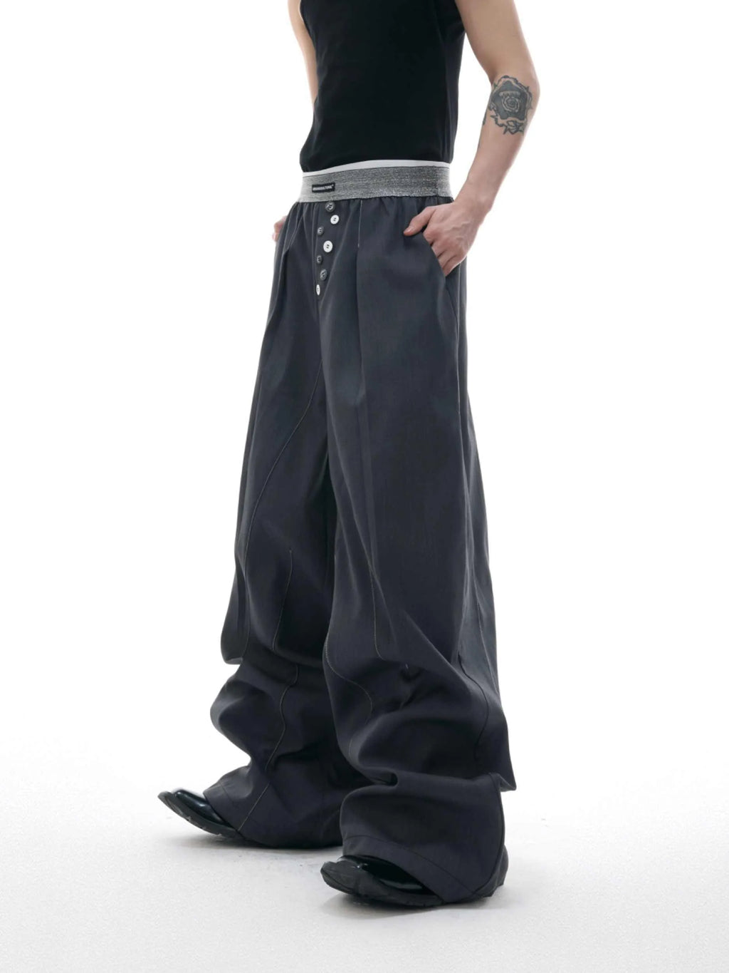 Drooping straight-leg suit pants in black with button open line design and high-waisted fit