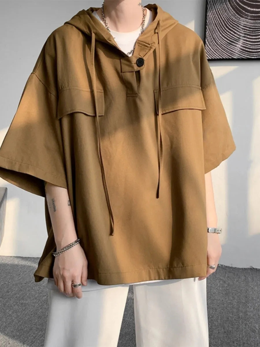 Man wearing a hooded short sleeve t-shirt in lightweight polyester fabric for summer