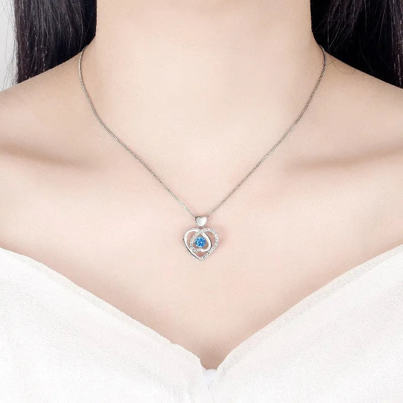 Blue diamond love heart necklace and bracelet jewellery set with mixed gem inlaid pendant