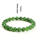 Natural Hetian jade jasper ball bracelet with polished beads on a wrist.