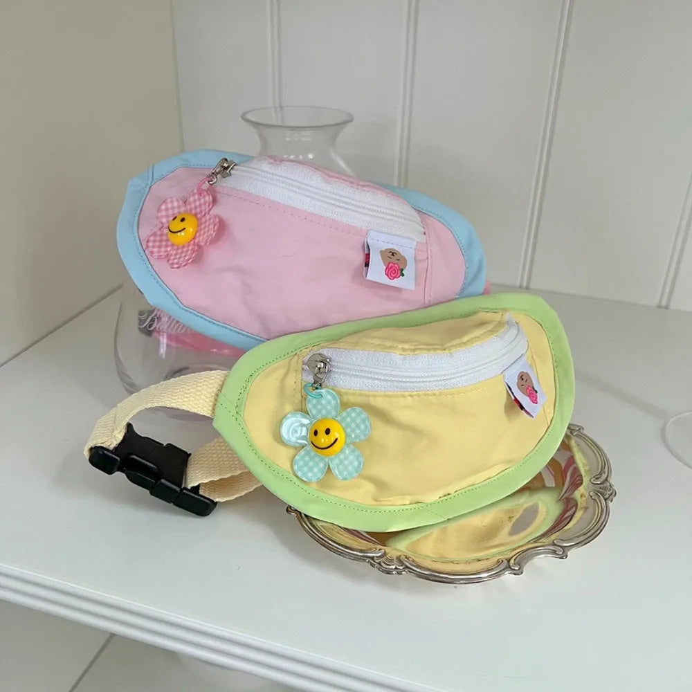 Powder blue, yellow and green backpack-style pet poop bag holder with adjustable shoulder strap