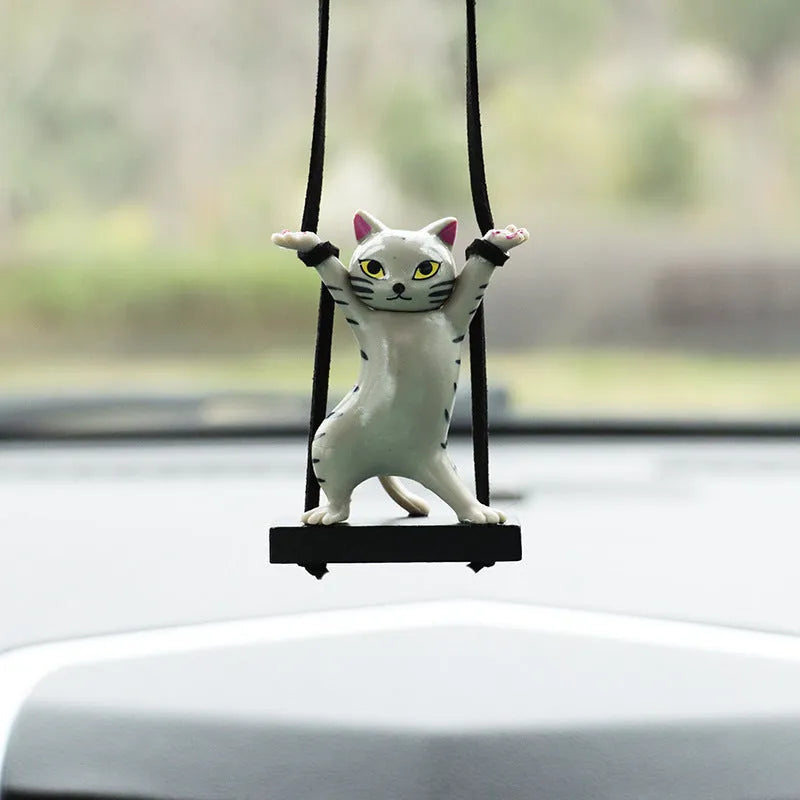 Resin cartoon cat pendant on a 25cm rope for car rear-view mirror decoration.
