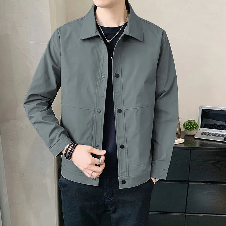 Men's Korean style single-layer thin jacket in grey, showing long sleeves and stitching detail