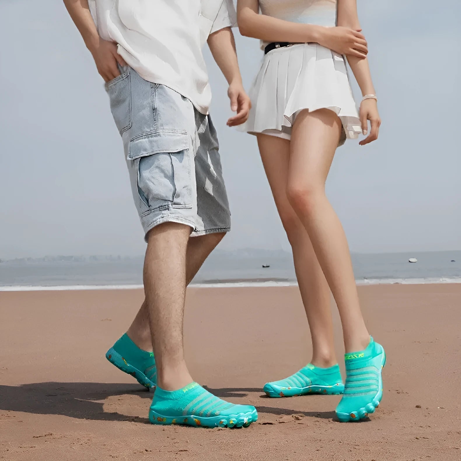 Men's lace-up water shoes in camouflage colour with Flyknit upper and rubber sole.