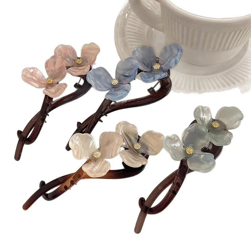 Retro flower acrylic bobby pin with petal design in blue colour for updo hairstyle